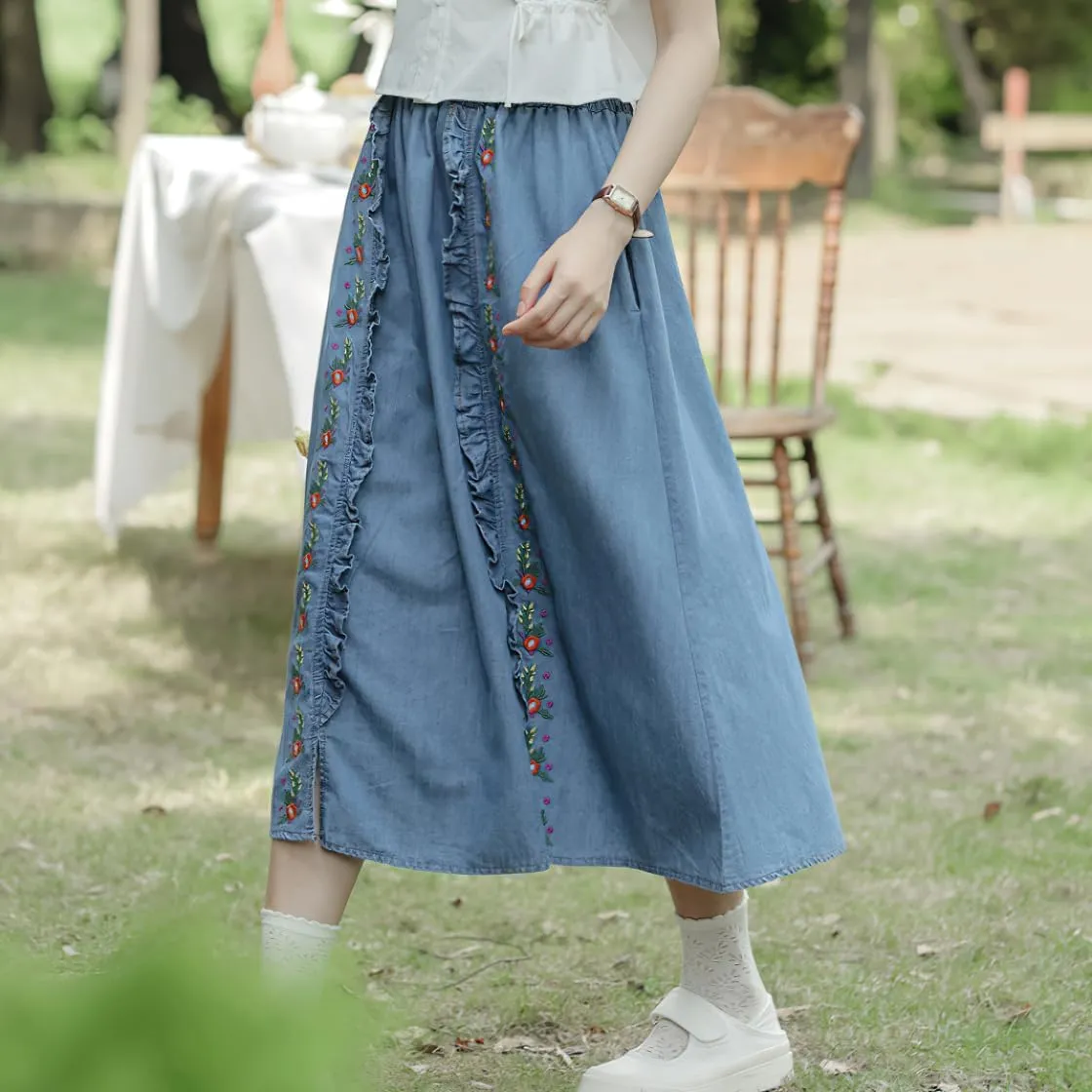 chouyatou Women's Floral Embroidered Elastic Waist Jean Skirt A Line Flared Denim Midi Skirt with Pockets