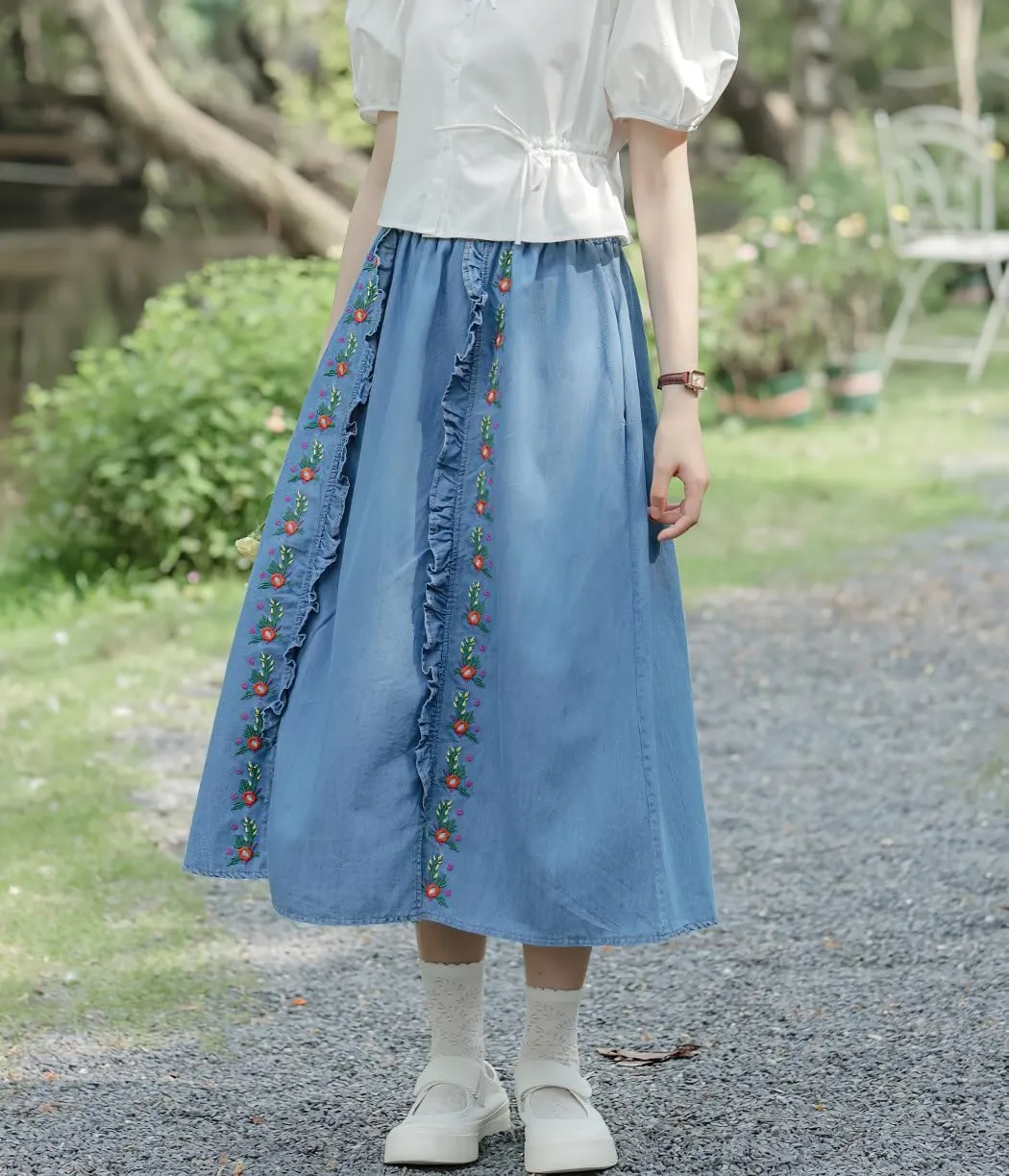 chouyatou Women's Floral Embroidered Elastic Waist Jean Skirt A Line Flared Denim Midi Skirt with Pockets