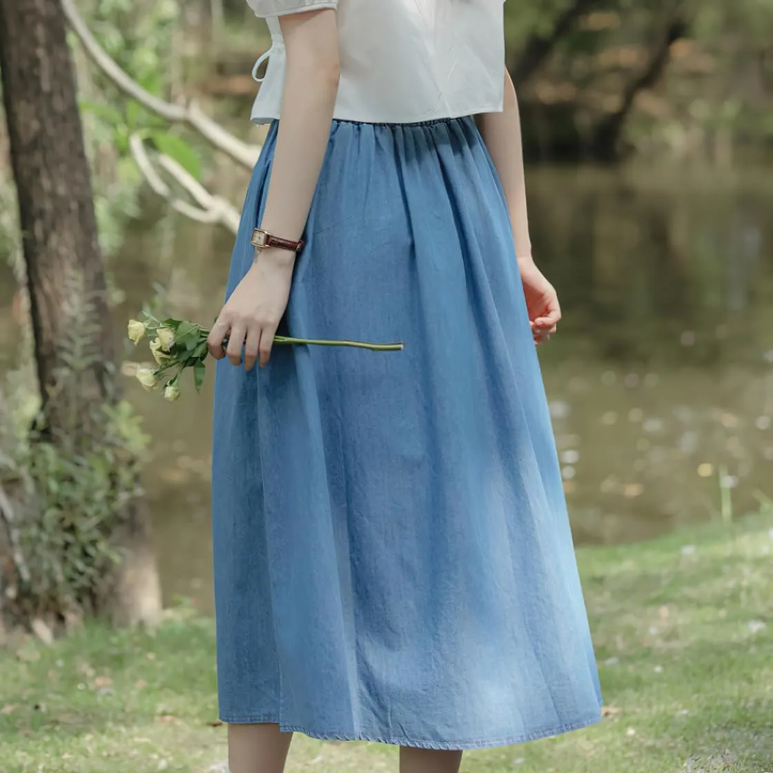 chouyatou Women's Floral Embroidered Elastic Waist Jean Skirt A Line Flared Denim Midi Skirt with Pockets