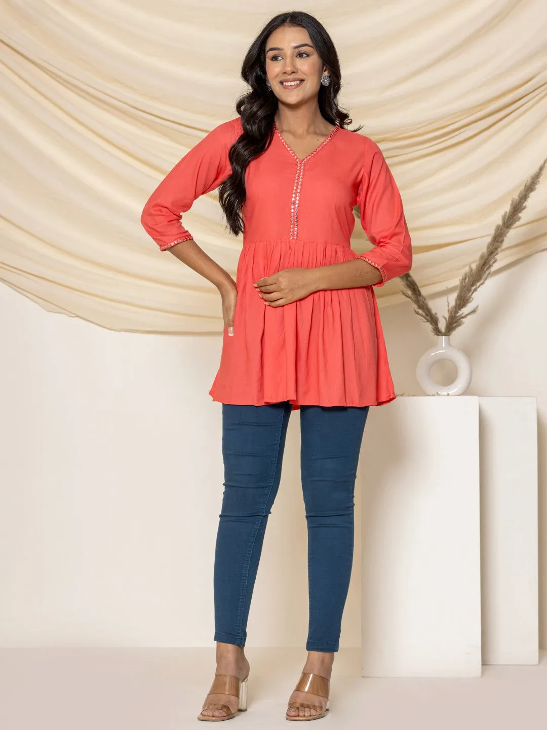 Solid Embroidered Peplum Top - Peach